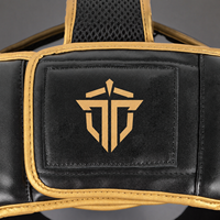 Casque de sparring noir et or en cuir PU avec garniture dorée, protection de tête pour boxe, Muay Thai, Kickboxing, Sanda, MMA, protection de tête pour adulte