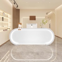 Comptoir de réception moderne rose en bois massif avec éclairage LED à deux niveaux pour salon de beauté, magasin de vêtements, studio de danse