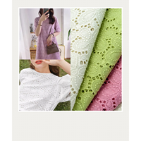 Vente d'usine 100% coton brodé dentelle tissu coloré 125cm coton creux durable pour vêtements et autres accessoires