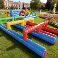 Accessoires amusants pour la journée sportive des enfants et des adultes, parcours d'obstacles gonflable super grand pour les jeux d'aventure de team building en plein air