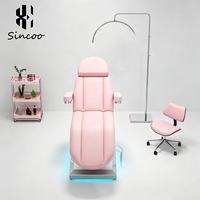 Lit de massage esthétique de luxe moderne en cuir PU avec base inclinable à 3 moteurs en acier inoxydable pour usage hôtelier