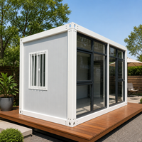 Maison modulaire bleue moderne, kit de maison détachable pour boutique mobile, café, bureau sur site avec porte coulissante en verre