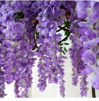 Vente en gros de fleurs artificielles en soie, glycine, pour décoration de mariage, fleurs murales, Noël, Pâques, vigne artificielle violette et verte