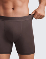 Caleçons Boxers Confortables et Doux pour Hommes, Taille Plus, Couleur Unie, Logo Personnalisé, Taille Mi-Haute, Jambes Longues, Sous-vêtements Respirants et Sans Coutures pour Hommes – Vente en Gros