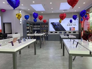 โต๊ะโชว์สินค้าสีขาวสำหรับร้านค้าปลีก <span class=keywords><strong>Apple</strong></span> แบบโมโนสโตร์ ออกแบบเองได้ โต๊ะร้านค้า MONO สำหรับโชว์โทรศัพท์มือถือ เฟอร์นิเจอร์ร้านค้าโทรศัพท์มือถือ - Product Image 2