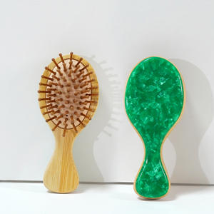 <span class=keywords><strong>แปรง</strong></span>หวีผมแบบเข็มด้ามไม้ไผ่สำหรับใช้ในบ้านหวีป้องกันไฟฟ้าสถิตย์เบาะอากาศทรงรีรีแบบ2025ใหม่ออกแบบได้ตามที่ต้องการ - Product Image 6