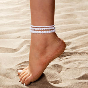 Vente en gros de bracelets de <span class=keywords><strong>cheville</strong></span> élastiques superposés pour femmes, style simple et tendance, avec de grandes et de petites perles - Product Image 6
