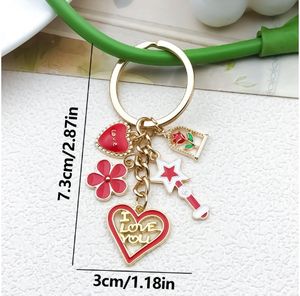 Goutte d'huile <span class=keywords><strong>Rouge</strong></span> Saint Valentin Bâton Magique amour Rose Fleur de Cerisier Porte-clés Créatif Internet <span class=keywords><strong>Rouge</strong></span> Pendentif Mignon - Product Image 4