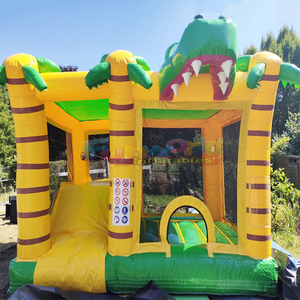 Castillo inflable comercial con tobogán y zona de saltos con diseño de dinosaurio para niños. - Product Image 4