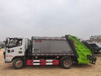 Camion à ordures compacteur Dongfeng 4x2 d'occasion, 10 m³, Euro 6 Diesel, garantie 1 an, pour le transport urbain des déchets, prix réduit