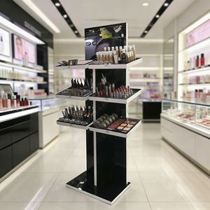 ชั้นวางเครื่องสำอางโลหะพร้อมกระจกและชั้นวางสำหรับวางบนเคาน์เตอร์ร้านค้าปลีก - Product Image 1