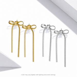 Pendientes de Cadena con Lazo, Acero Inoxidable, Variantes en Tono Dorado y Plateado, Lazo Plano Texturizado, Borlas Largas - Product Image 1