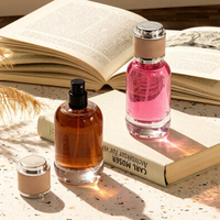 Flacon de parfum en verre cylindrique de luxe 30ml 50ml avec surface givrée et pompe pulvérisatrice à capuchon rose