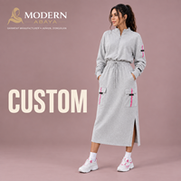 Robe longue en maille sportive à col montant semi-zippé, taille à cordon de serrage, poches cargo, décontractée, hiver, tenue modeste, vente en gros personnalisée
