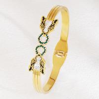 Bracelet manchette en acier inoxydable plaqué or 18 carats PVD, style vintage punk, tête de léopard/panthère ornée de zircons cubiques, pour femme