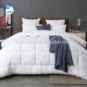Fabricant chinois 100% <span class=keywords><strong>creuse</strong></span> <span class=keywords><strong>siliconée</strong></span> <span class=keywords><strong>polyester</strong></span> rembourrage en fibres blanc <span class=keywords><strong>couette</strong></span> - Product Image 1