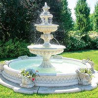 Grande fontaine à eau en marbre blanc sculptée à la main à 3 niveaux avec relief floral pour projet de jardin de villa extérieure