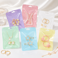 100 pièces/sac Sachets holographiques en Mylar à fermeture éclair pour bijoux, poudres, aliments secs, noix, bonbons, emballage irisé