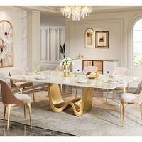 Table à manger moderne pour la maison avec base en acier inoxydable doré, plateau en céramique, design rectangulaire pour la maison de luxe, l'hôtel ou l'appartement