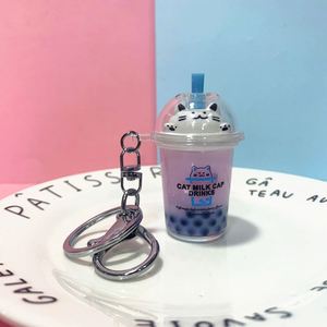 Porte-clés en acrylique avec pendentif chat mignon de dessin animé et paillettes, avec tasse de thé au lait et sable mouvant liquide, pour sacs et voitures (femmes, hommes, enfants) - Product Image 4
