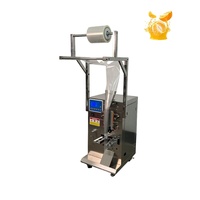 Machine de remplissage et d'emballage d'huile, machine de remplissage et d'emballage de jus de fruits et d'eau en sachet