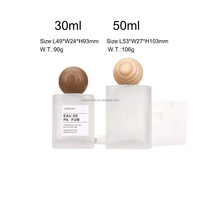 Flacon de parfum en verre givré de luxe rechargeable de 30 ml, atomiseur de parfum rechargeable avec bouchon à vis et estampage doré, vente en gros