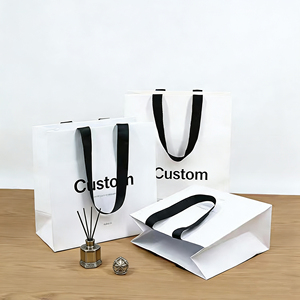 Sacs de transport de luxe sur mesure à <span class=keywords><strong>prix</strong></span> compétitif, sacs cadeaux portables en papier kraft de Chine en gros, petits sacs en papier avec poignée et logo imprimé - Product Image 2