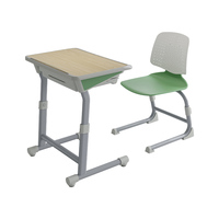 Ensemble de chaise et de bureau d'école moderne, écologique et durable avec plateau en bois, structure en acier, plastique PP, taille simple/double pour usage commercial