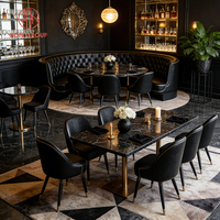 Canapé de restaurant moderne de luxe en cuir noir avec base en métal doré et table en marbre, mobilier de restaurant écologique et durable