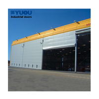 Puerta de Lona PVC Sobredimensionada con Estructura de Acero Reforzada para Hangares y Centros de Mantenimiento Aéreo