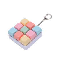 Bouton anti-stress créatif Macaron 9 touches, gadget fantaisie, porte-clés de décompression pour les doigts