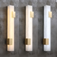 Applique murale LED en cuivre et albâtre de luxe français, style moderne et simple, bande lumineuse 3000K, pour salon, chambre, couloir, éclairage décoratif.