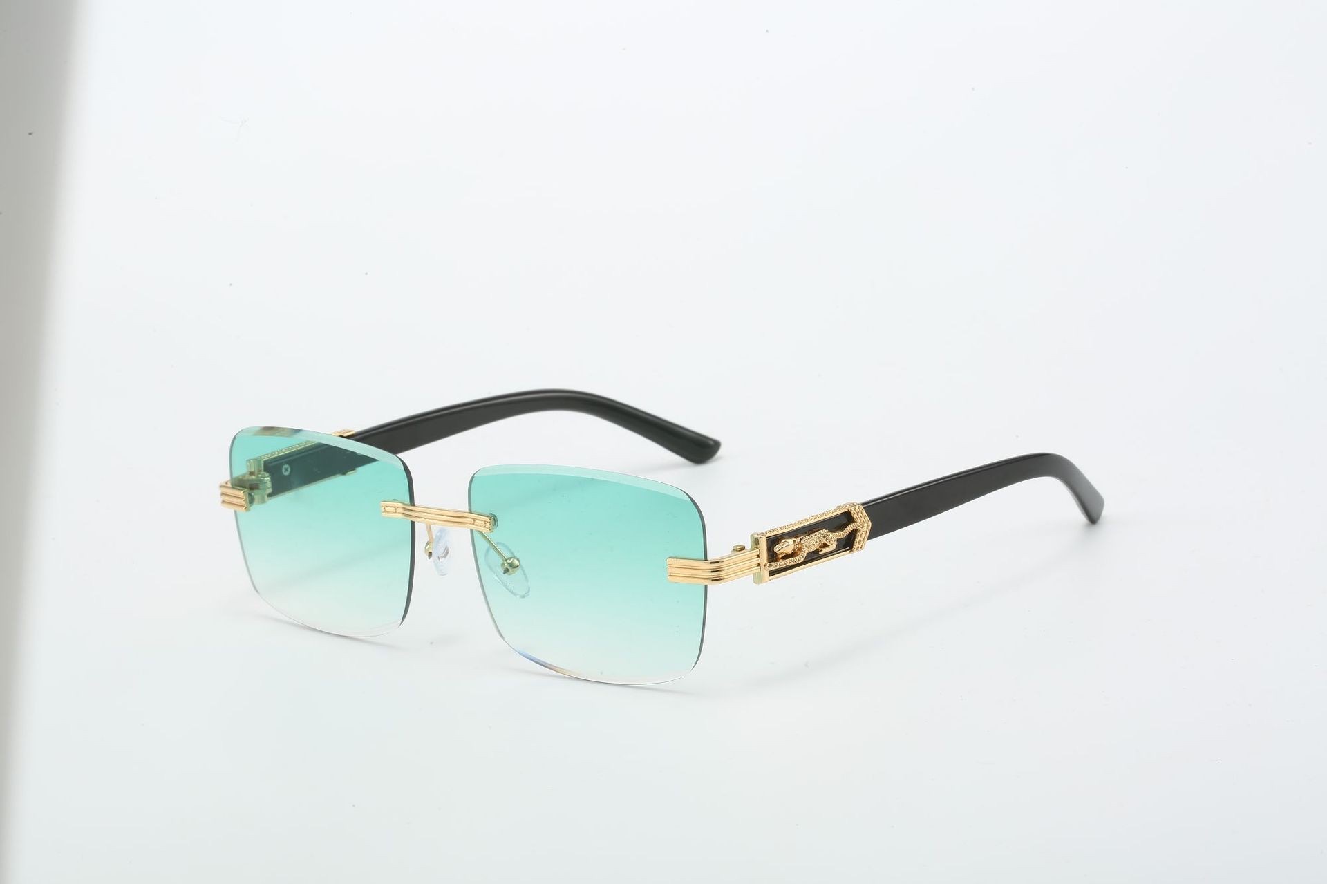 Gold frame green lenses