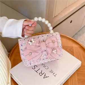 Mới của Hàn Quốc trẻ em Crossbody công chúa Túi Chuỗi Ngọc Trai Túi xách Bow Casual ít gói cô gái