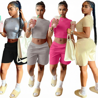 Ensemble court deux pièces tricoté pour femme, été 2026, décontracté, uni, avec logo personnalisé, haut court à col rond et poches, en polyester/coton, séchage rapide