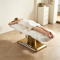 Table de massage électrique de luxe en acier inoxydable doré avec commande au pied, lit de soin pour spa facial, lit de beauté pour cils