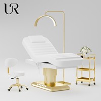 La table de message de lit facial électrique de lit de beauté de spa de salon de chauffage à un bouton inclut le design moderne blanc avec la lumière d'ambiance