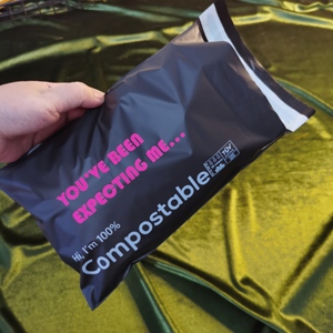 black compostable biodegradable clothing packaging plastic shipping envelops postage custom mail mailing bags poly mailers matte