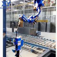 Station de soudage automatique cantilever avec robot Yaskawa AR2010, entraînement servo-électrique PLC, protection IP67, capacité de production de 100 unités