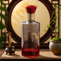 Les bouteilles de vin avec feuille imprimée d'or de dragon chinois sur le corps de bouteille peuvent être transformées en bouteilles de vin en verre entièrement transparentes