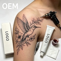 Vente en gros de tatouages personnalisés au logo, effet soyeux, adaptés aux artistes tatoueurs professionnels et aux postes de travail des salons de beauté