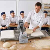 Machine à étaler la pâte commerciale en acier inoxydable pour le pain, les croissants, les tartes, la pâte à rouler, utilisation en boulangerie