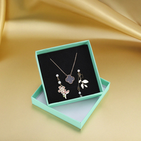 Boîte à bijoux chic rose pastel et bleue avec couvercle et base, avec éponge pour collier et bague