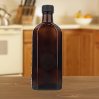Vente en gros de bouteilles en verre ambré plates de 50 ml, 100 ml, 150 ml avec bouchon à vis noir, emballage en verre plat vide unique