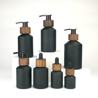 Flacon en verre noir mat à épaule inclinée 15 ml 30 ml 60 ml 100 ml 125 ml 200 ml Flacon cosmétique avec fermeture en bois