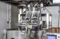 Machine d'emballage verticale automatique multi-têtes pour sachets de cacahuètes grillées, noix de cajou, céréales et snacks, avec pesage et scellage alimentaire