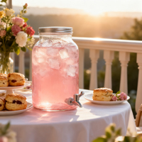 Distributeur de boissons en verre transparent avec serveur de boissons en gros d'usine de robinet en métal pour l'approvisionnement en jus de thé et de limonade