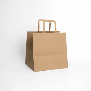 橙色工艺牛皮纸购物袋，带扁绳手柄，用于礼品包装和超市使用定制标志艺术纸