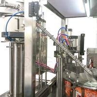 Machine d'emballage automatique pour sachets souples à bec verseur avec remplissage et scellage par vissage de bouchons, avec prix