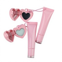 Schattig draagbaar 2-in-1 fruit lipgloss & hartvormige kleurveranderende blushcrème met spiegel sleutelhanger 2 kleuren aangepaste logo